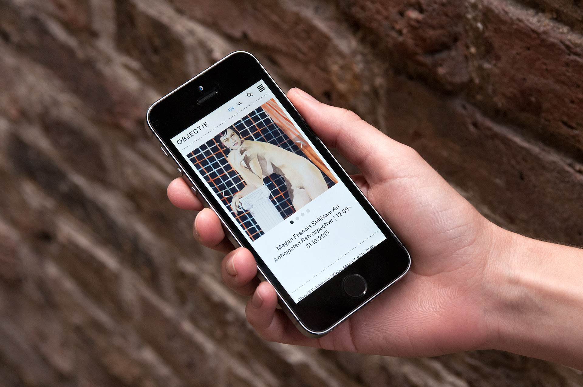 Objectif Exhibitions website on an iPhone 4S